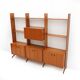 Library with wooden uprights by A.V. Contemporary Furnishings, 1960s.