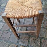 Low straw stool wooden structure