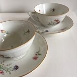 Duo of white Limoges porcelain cups with flowers