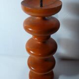 Vintage wooden candlestick turned orange
