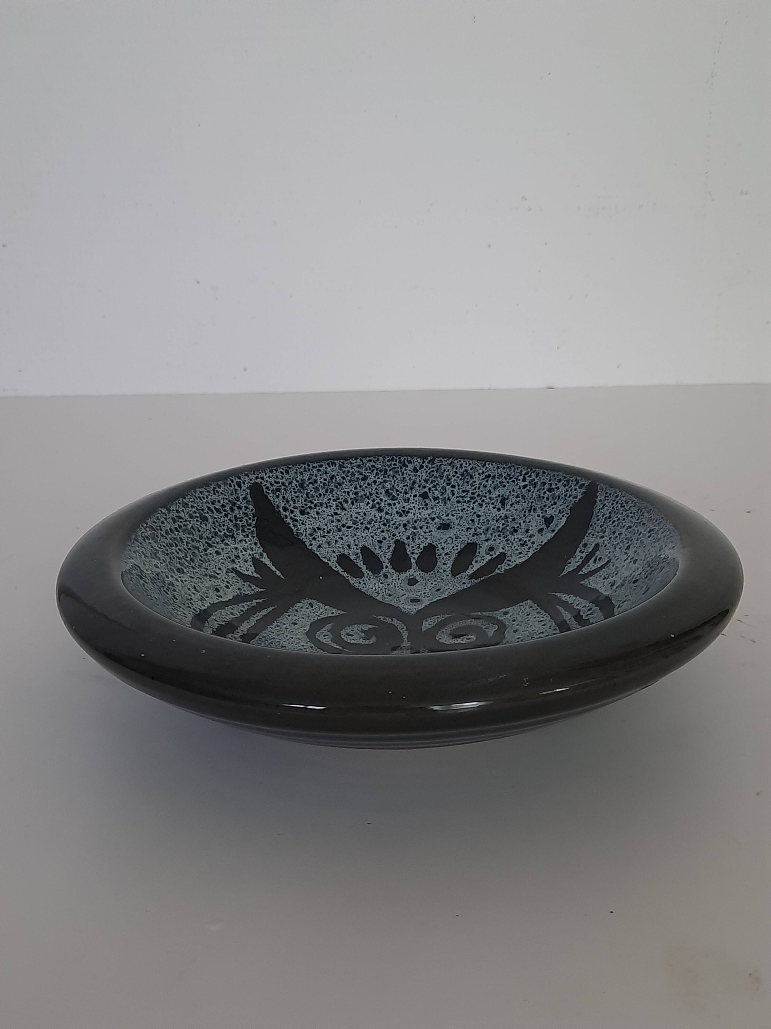 Pocket emptier by lotus pottery