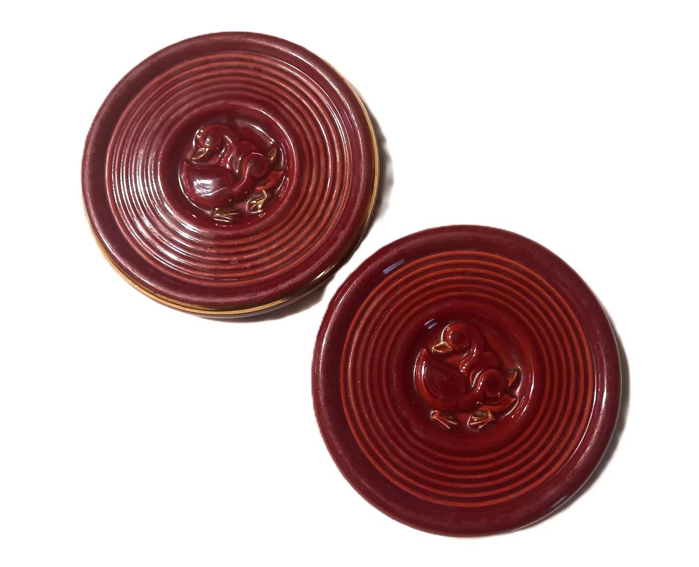 Pair of 1950s earthenware bottle coasters