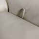 Two-seater designer sofa De Sede DS-2011 in cream leather with adjustable backrest.
