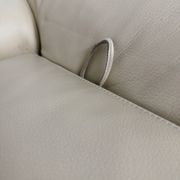 Two-seater designer sofa De Sede DS-2011 in cream leather with adjustable backrest.