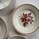 set of 1970s flower plates
