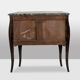 Commode sauteuse de style Louis XV en laque. Années 1950.