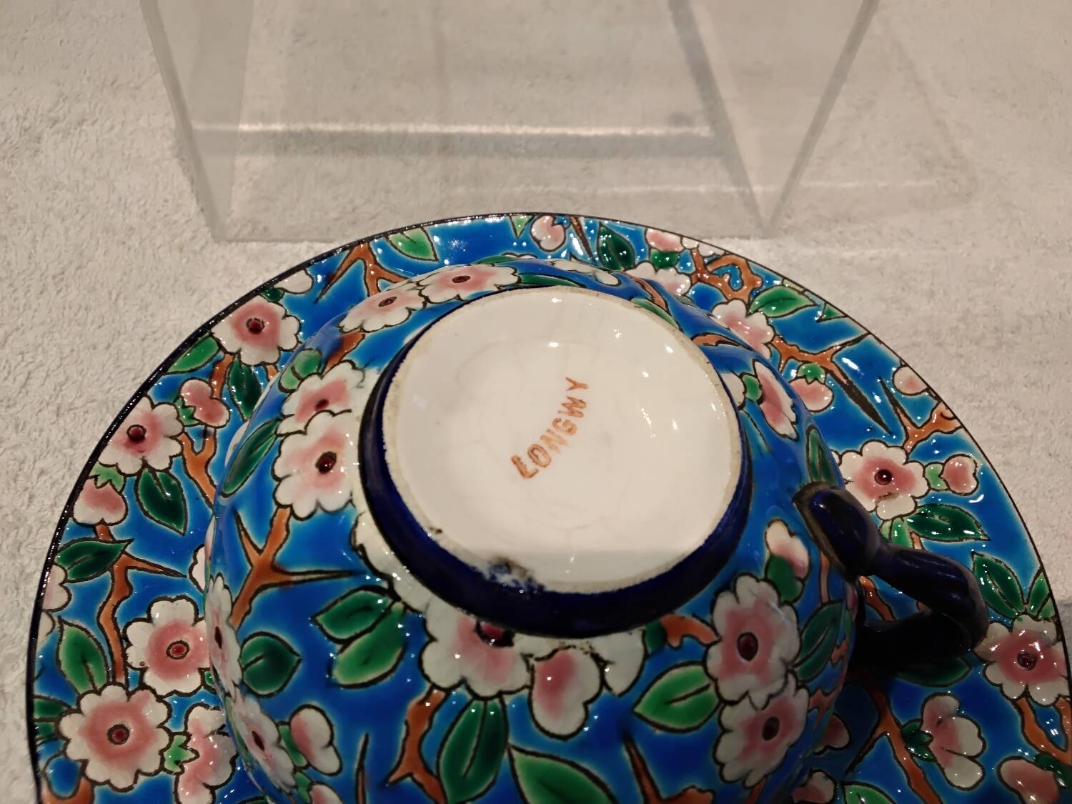 32cl teacup and saucer, Longwy enamel, apple blossom design, 188