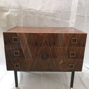 Lacquered 3-drawer chest with rosewood veneer.