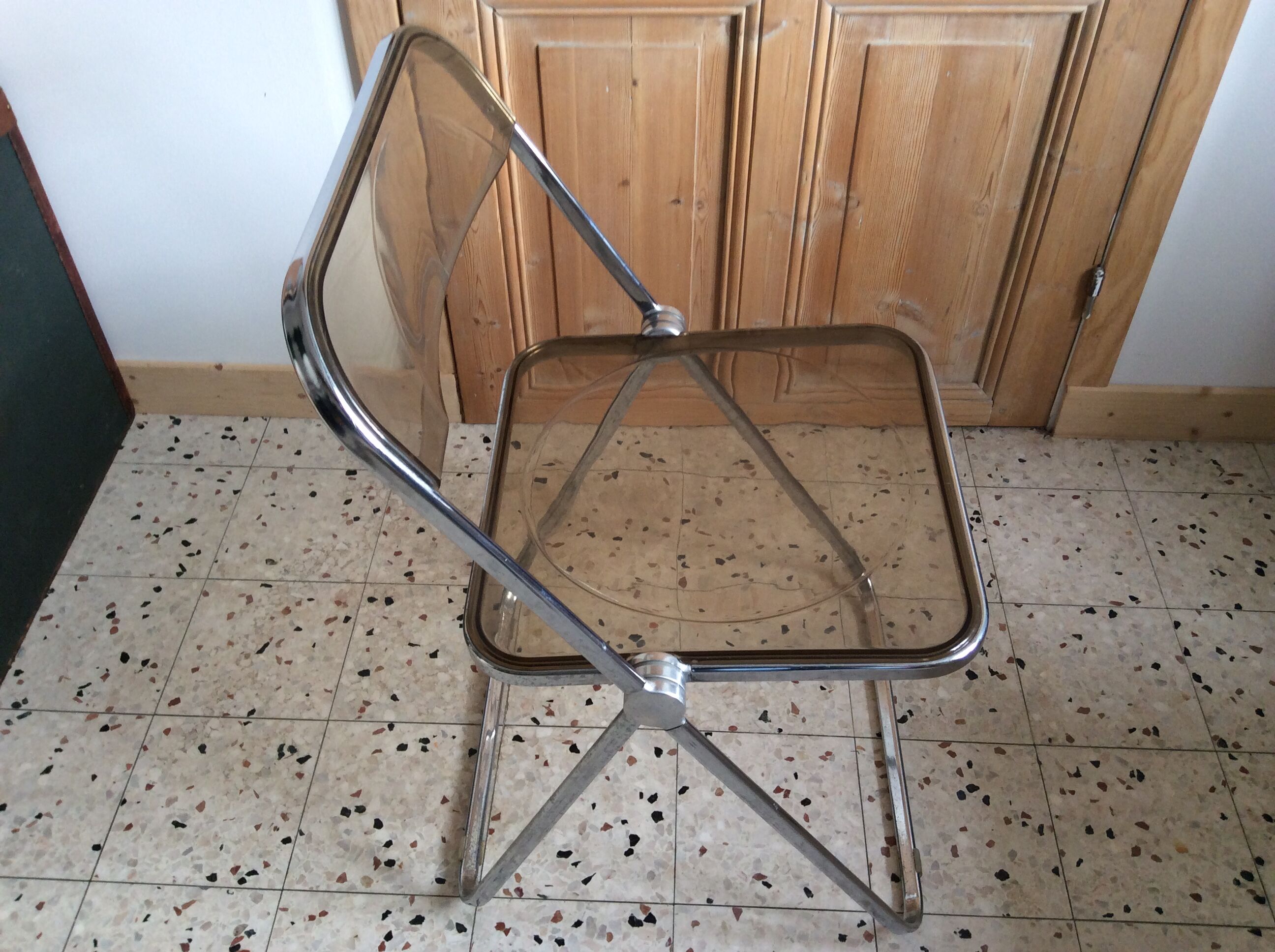 Folded chair by Giancardo Piretti for Castelli