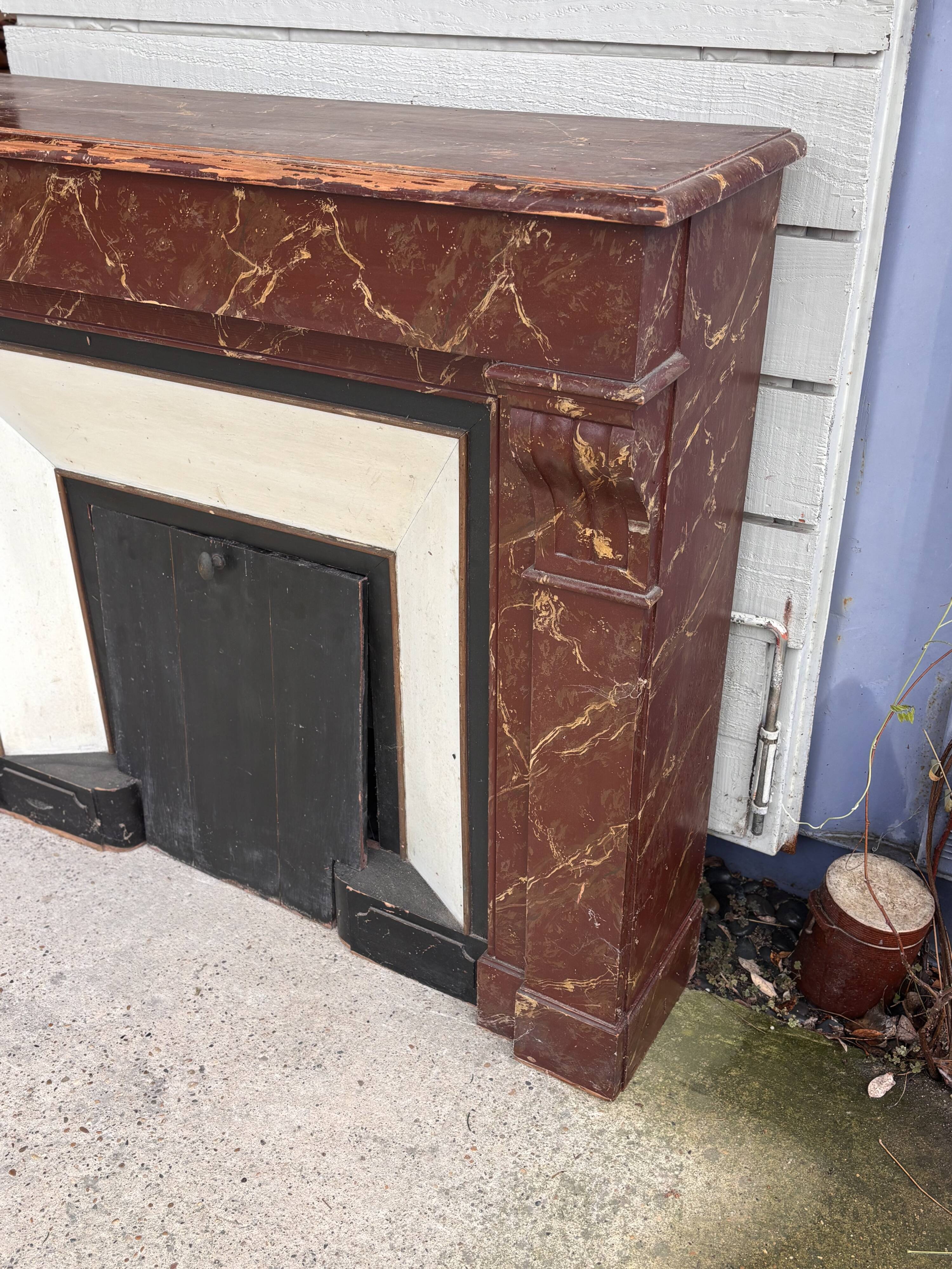 Wooden fireplace mantel imitating marble