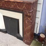 Wooden fireplace mantel imitating marble