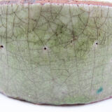 Bowl or empty pocket in cracked green sandstone varnish raku