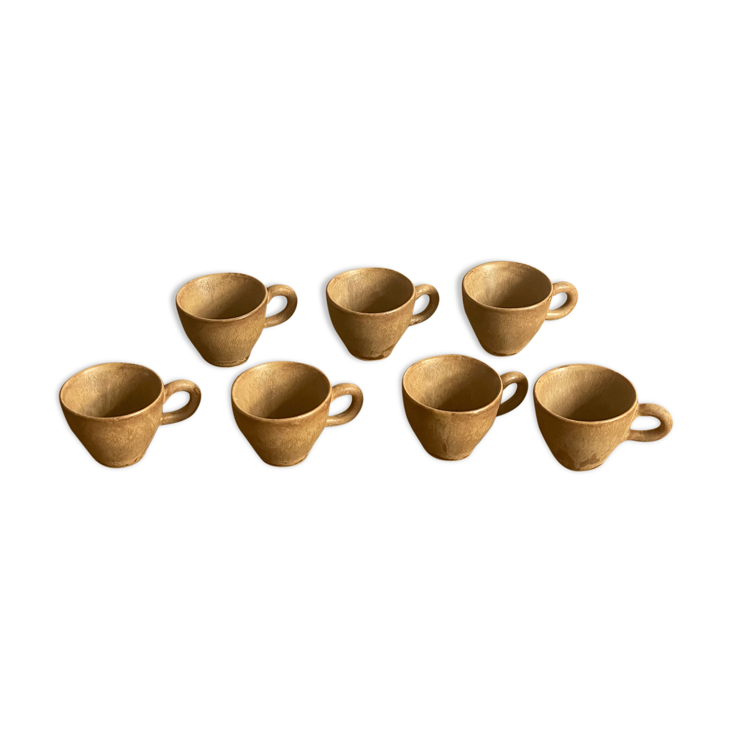 7 very small old sandstone coffee cups