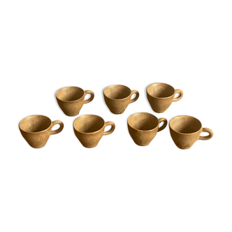 7 very small old sandstone coffee cups