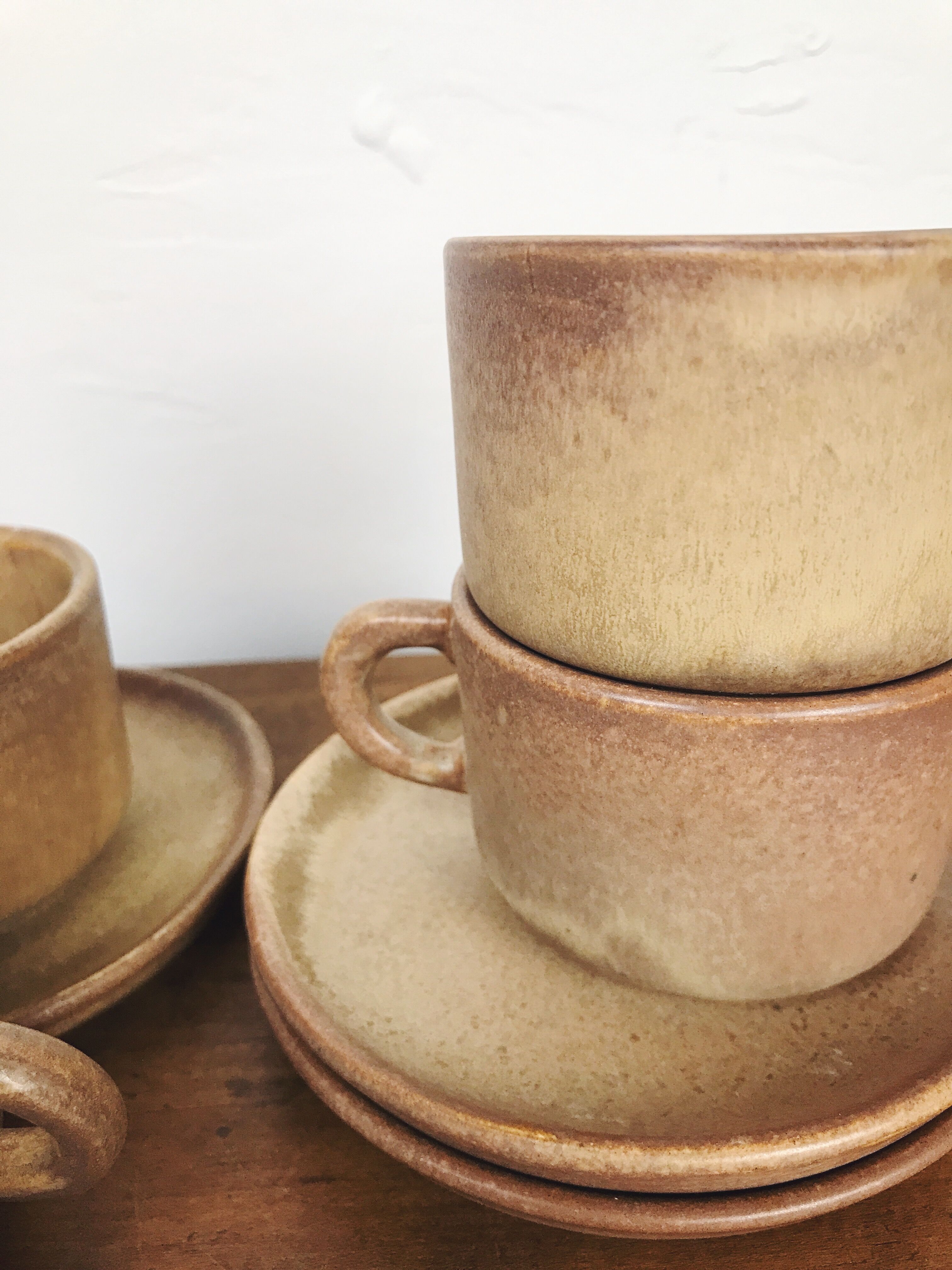 4 sandstone cups with under cups