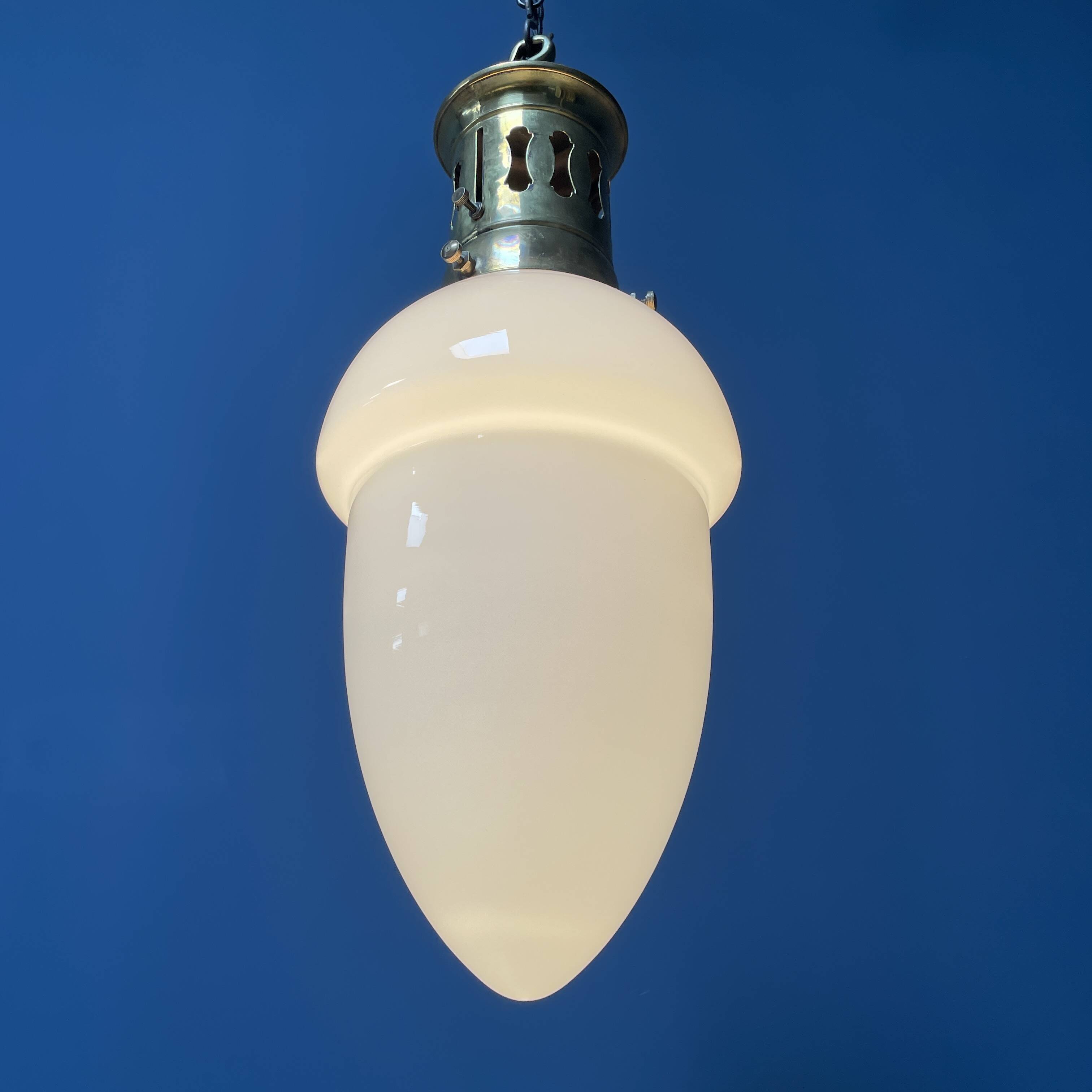 Opaline glass pendant lamp with elegant brass fixture