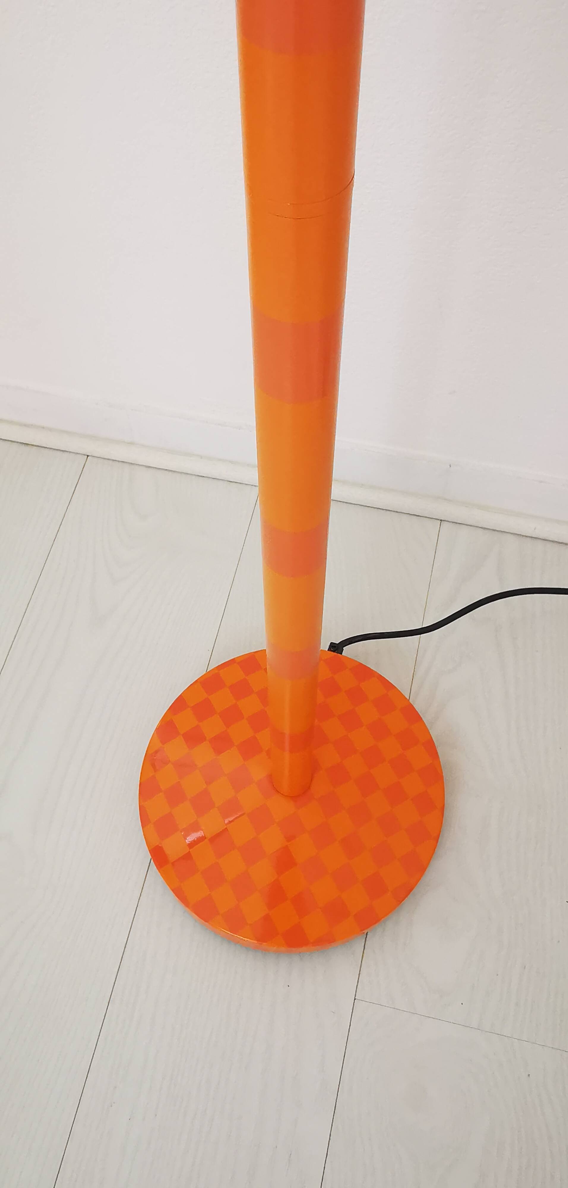 Checkerboard orange floor lamp
