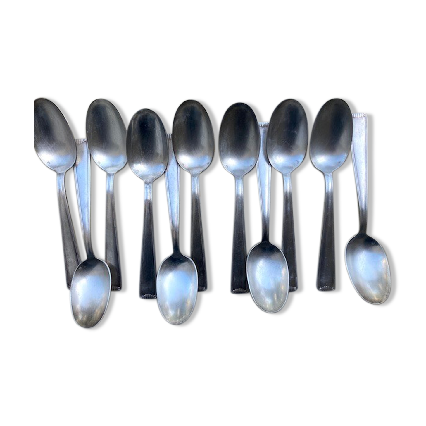 11 cuillères à soupe en métal argenté