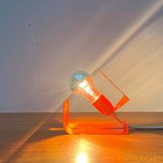 Orange metal table lamp, minimalist, modern mid-century space age, 1960s.