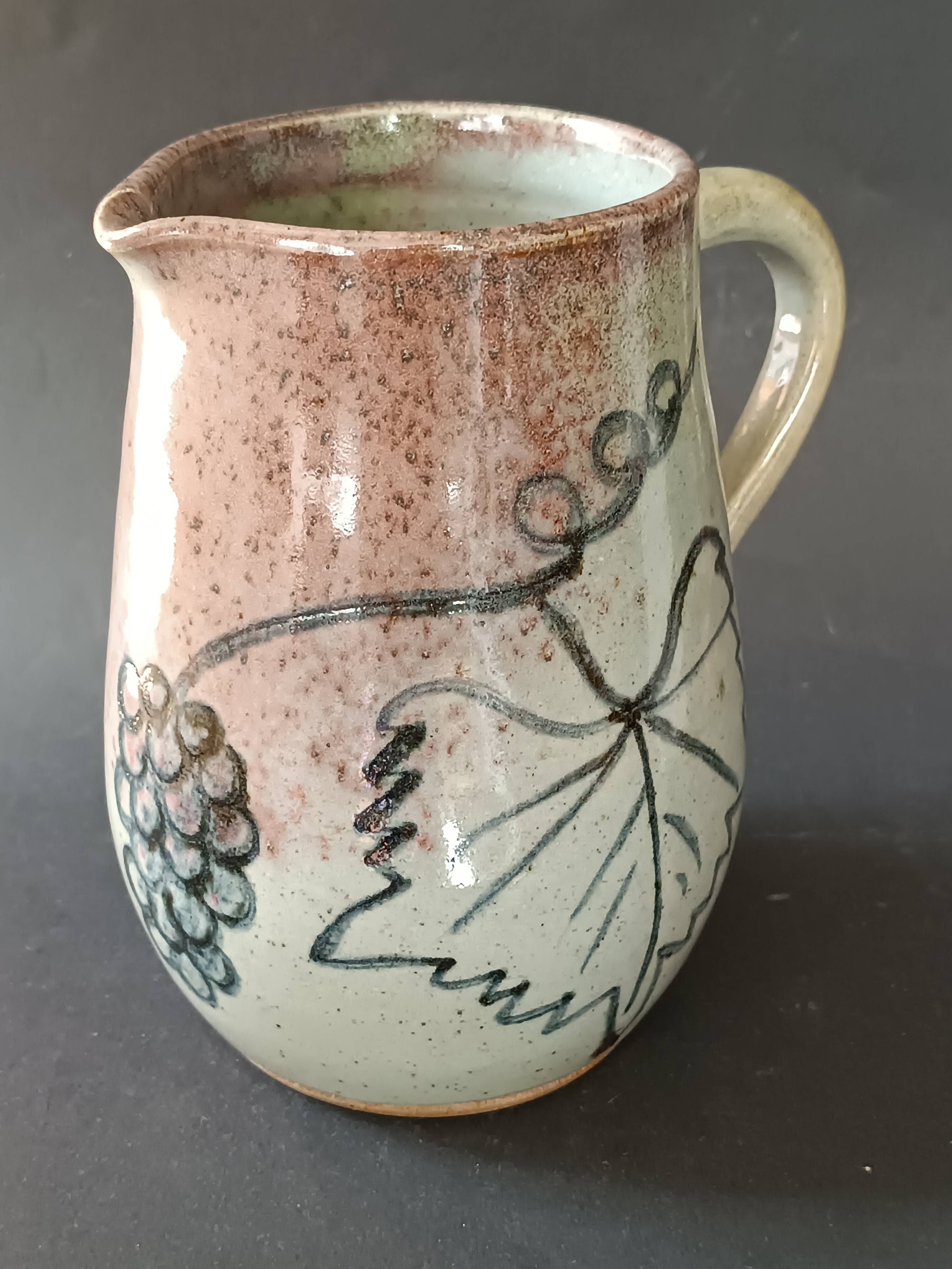 Stoneware pitcher from Alsace, incised decoration of vine by Louis Buecher 1986.
