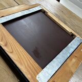 Vintage black mirror from the 1930s/40s with shelf.