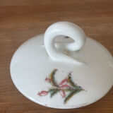 Beautiful vintage porcelain sugar bowl with a floral pattern.
