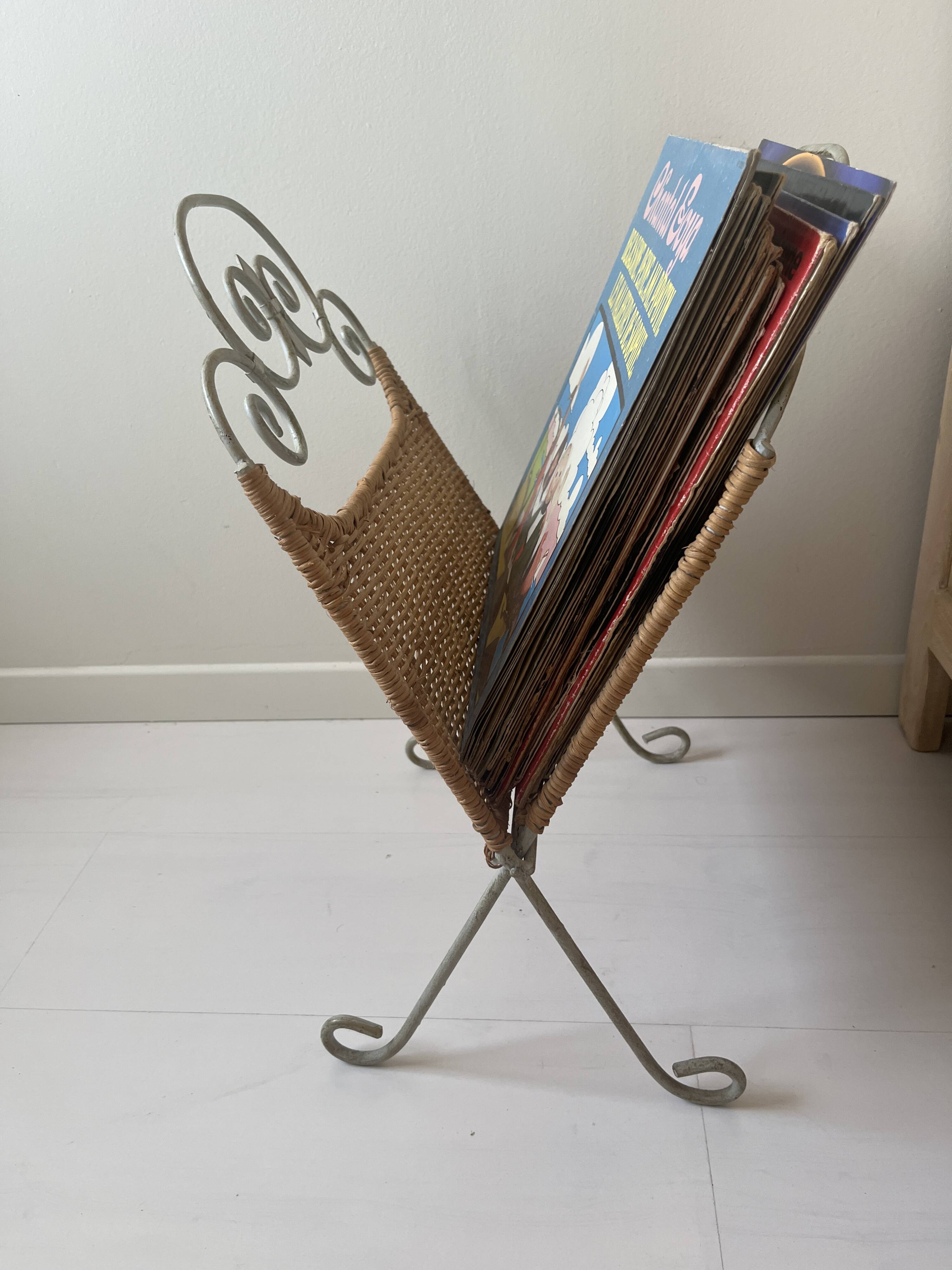 Rattan and shabby wrought iron magazine rack