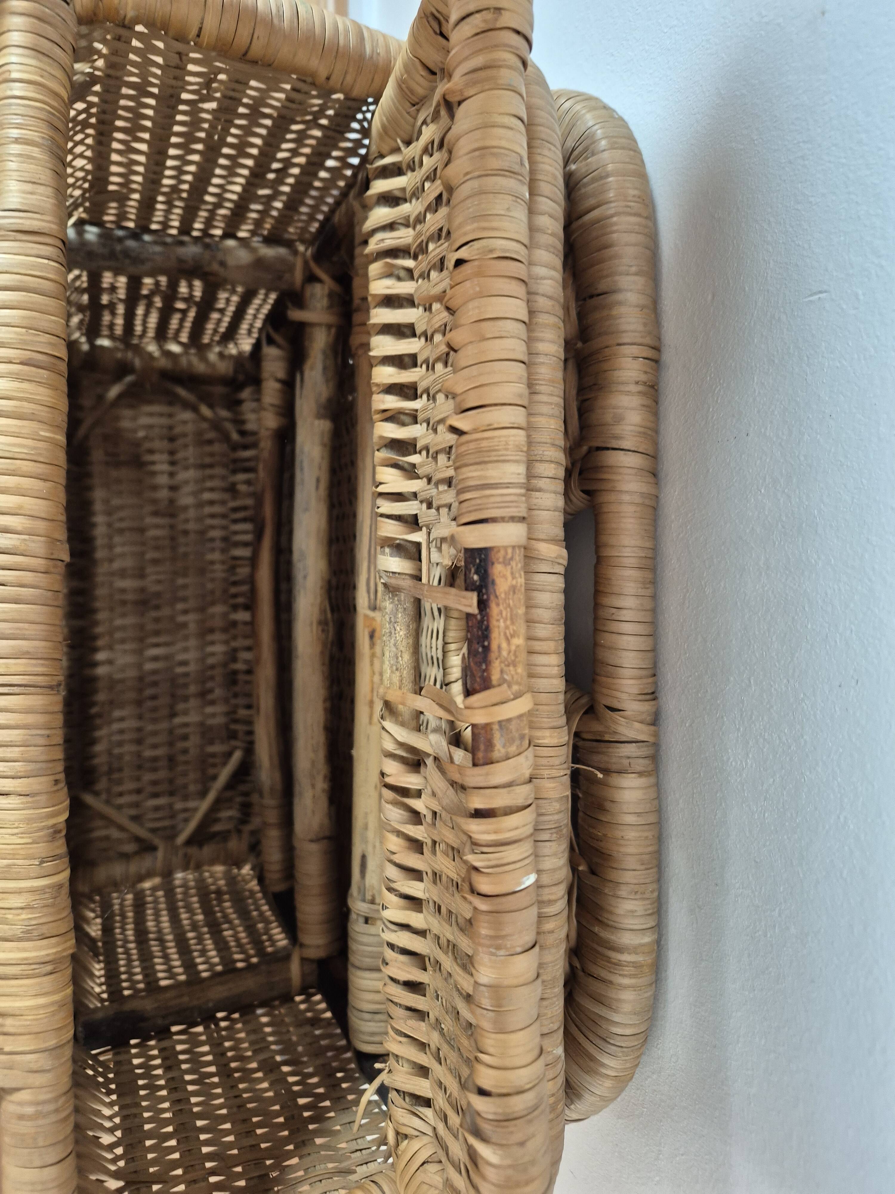 Vintage foldable beach chair, picnic in rattan and leather.