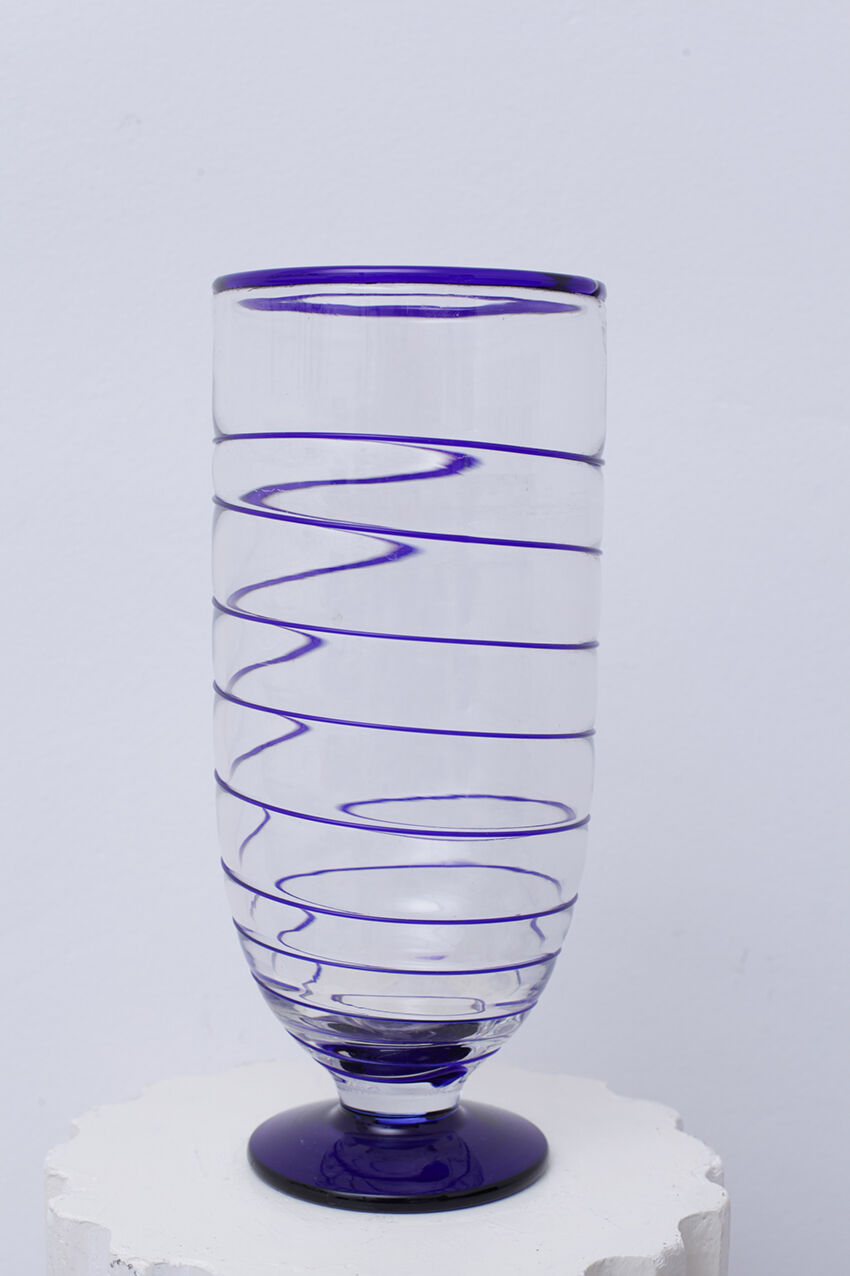 Transparent Murano glass vase and blue net