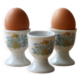Vintage white porcelain egg cups with floral pattern