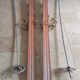 Old skis wooden and its pair of sticks