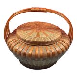 Worker vintage wicker covered basket