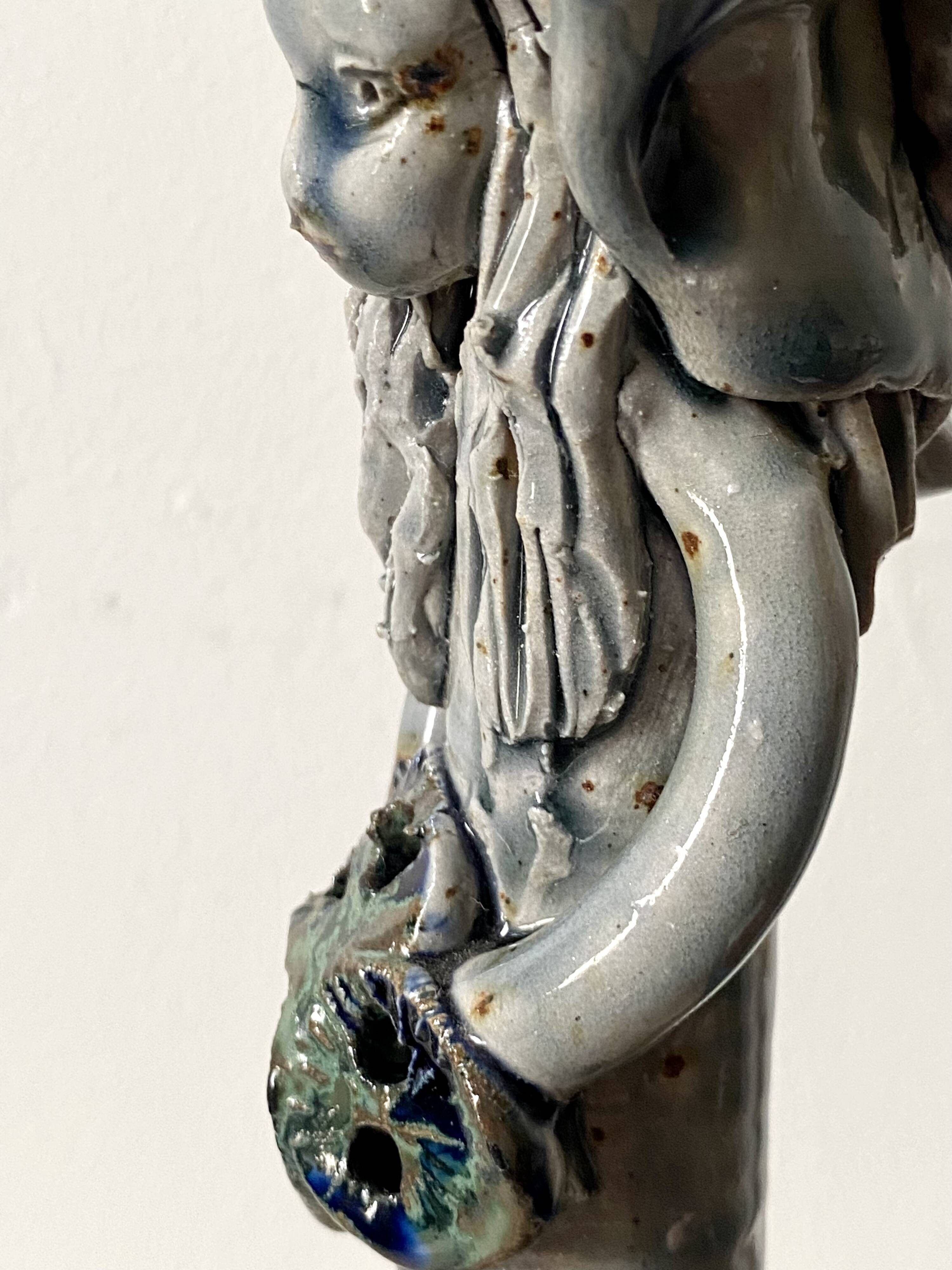 Anthropomorphic ceramic candlestick