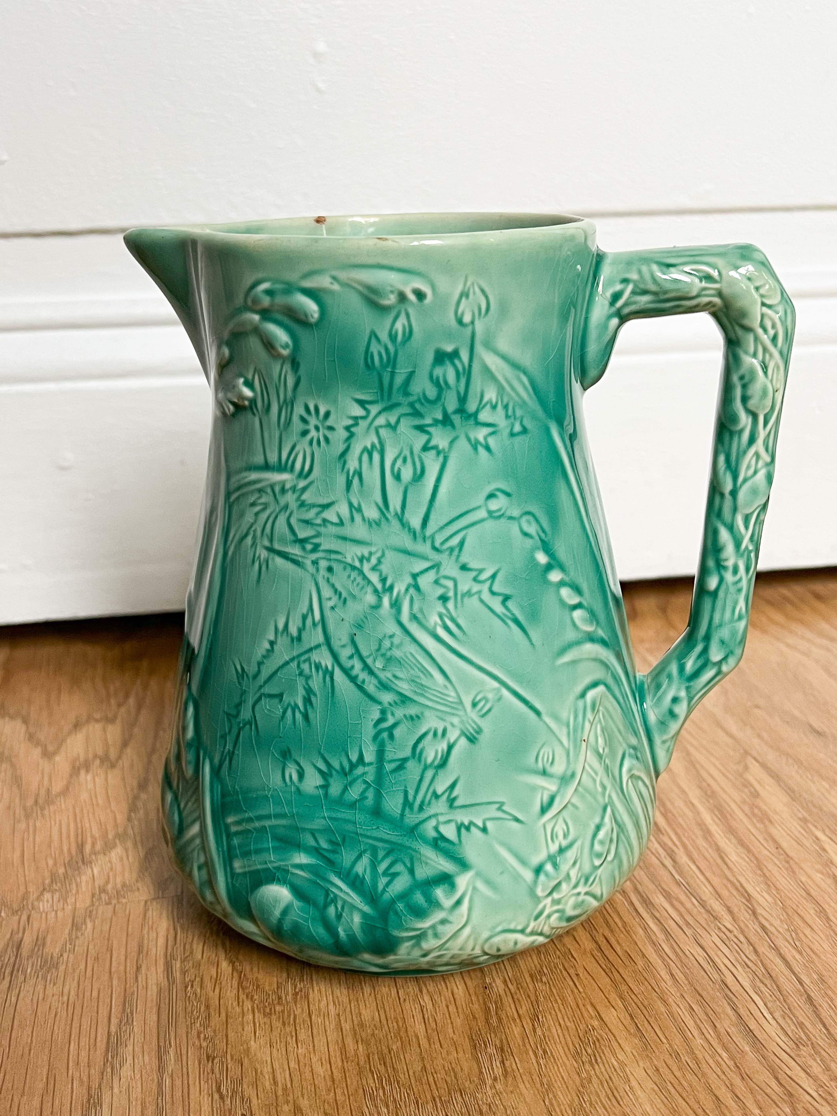 Decorative water decanter in painted ceramic