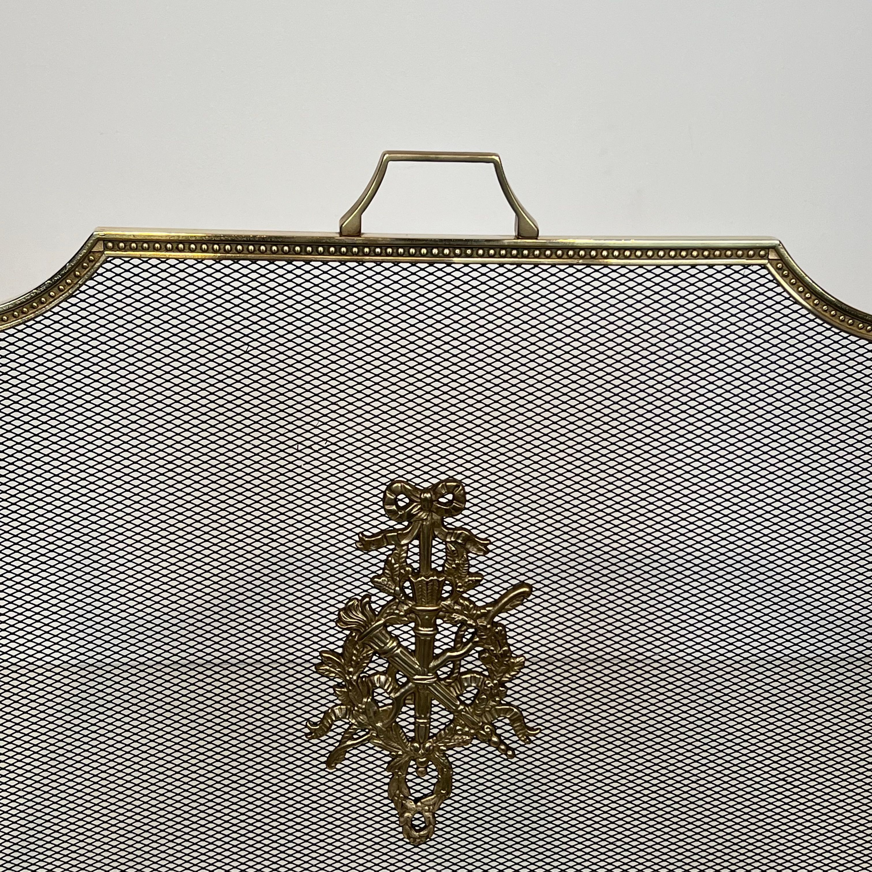 Brass fire screen and grille in the Louis XVI style in the taste of Maison Jansen.