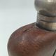Silver-plated metal flask with leather and glass