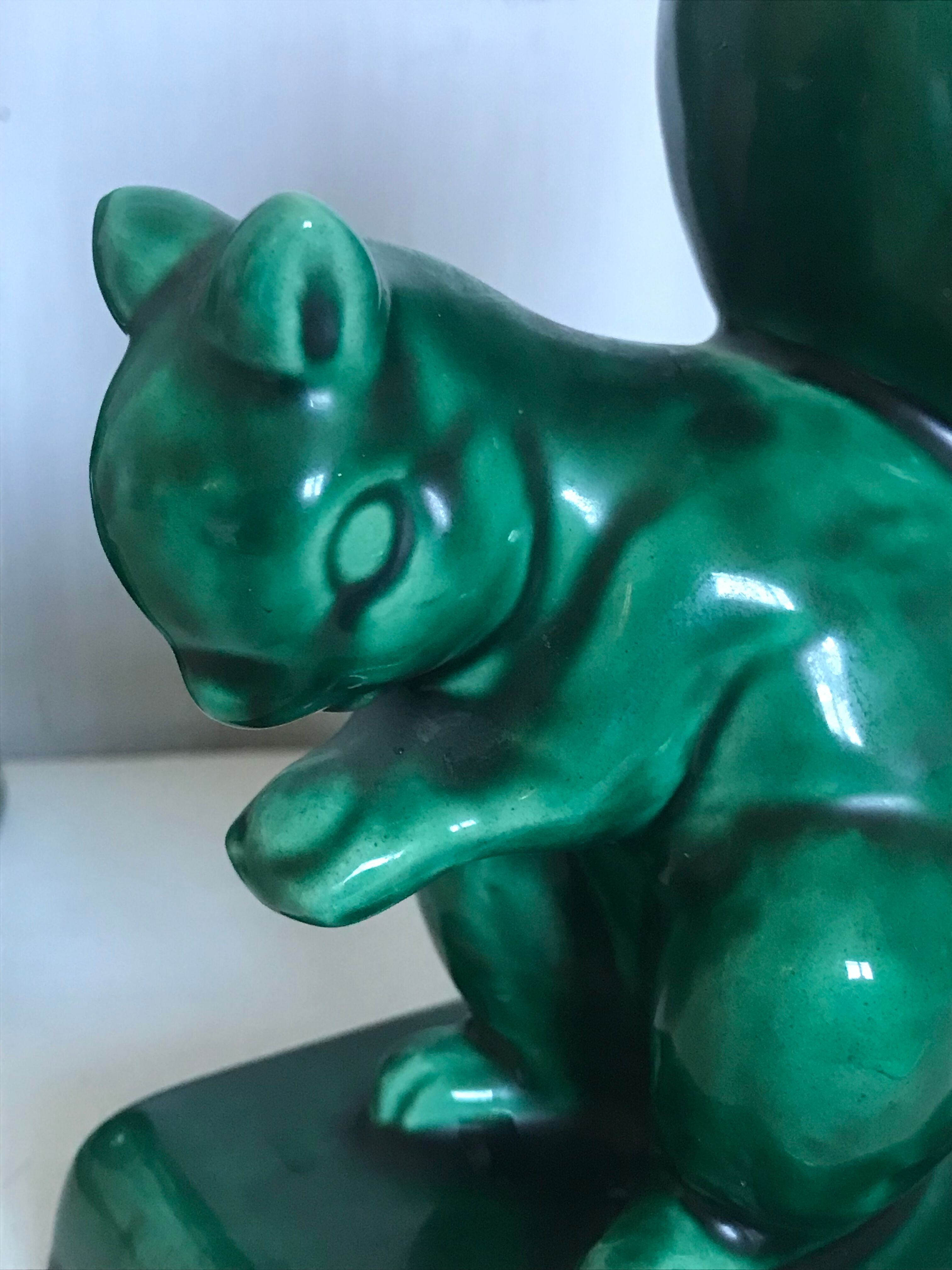 Pair of Art Deco ceramic book clamts