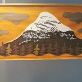 Beautiful wall-mounted Swedish fabric print with motifs of mountains, reindeer and more.