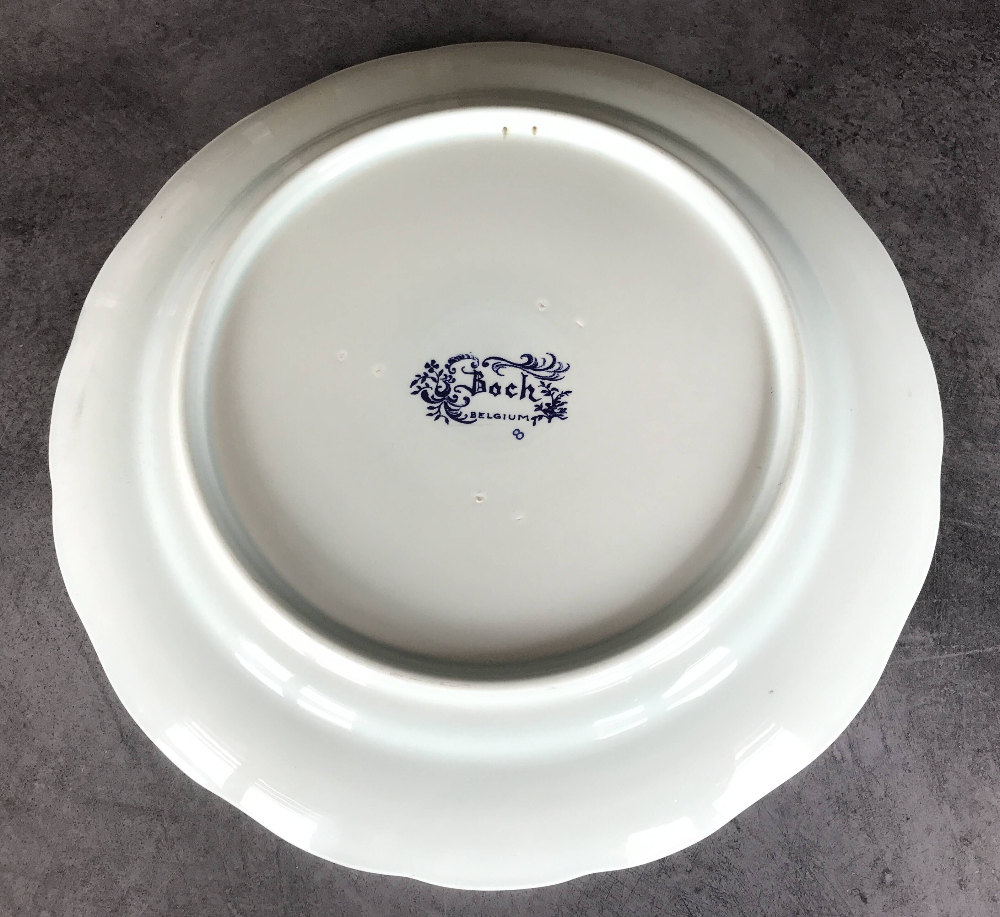 Blue enamelled earthenware wall dish with peasant scene decor Boch La Louvière