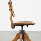 Antique late 19th century English office chair with reclining backrest and height adjustable