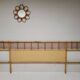 Rattan headboard with vintage bedside tables 1960