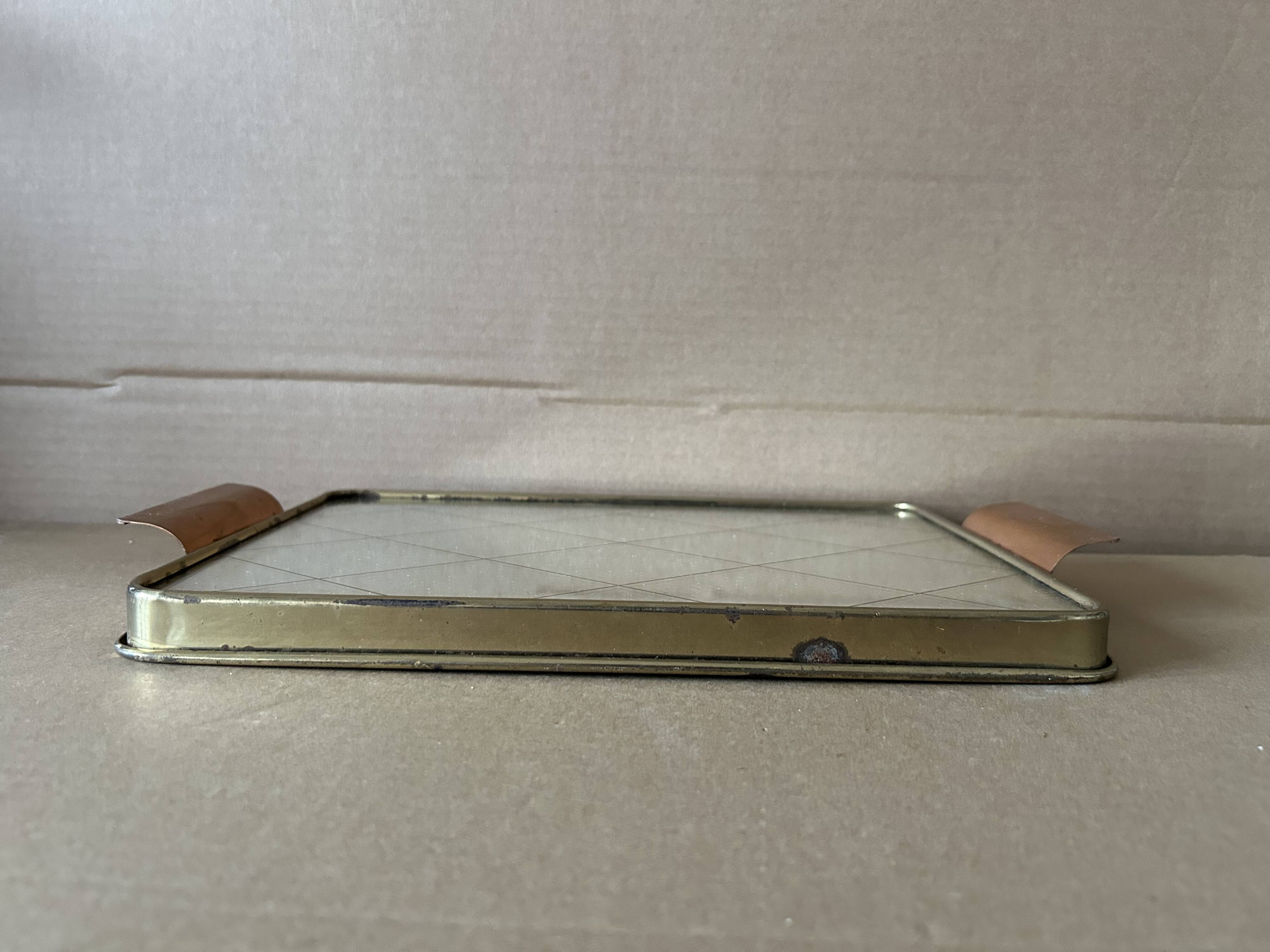 Metal tray and antique mirror