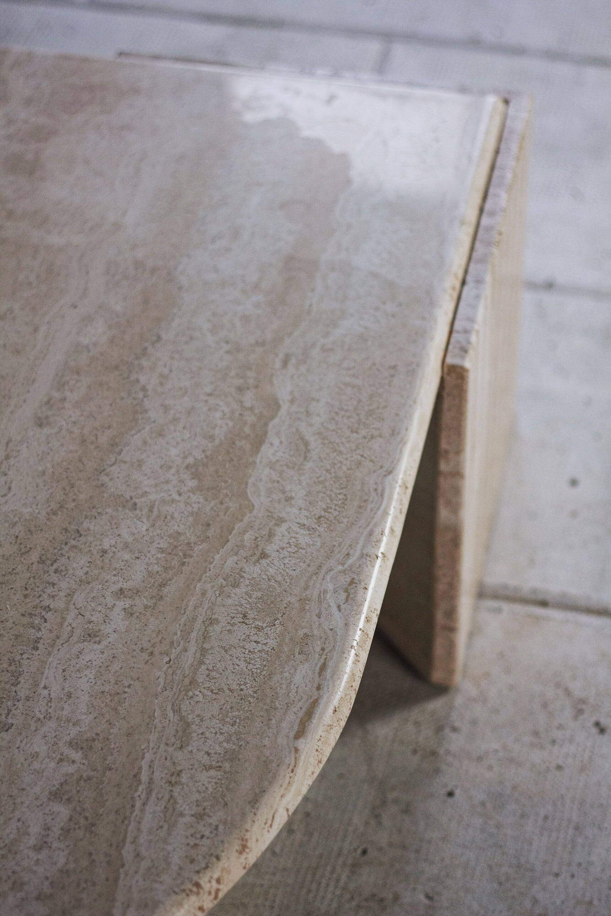 Travertine coffee table "Eye" or "drop" by Roche Bobois, 1980