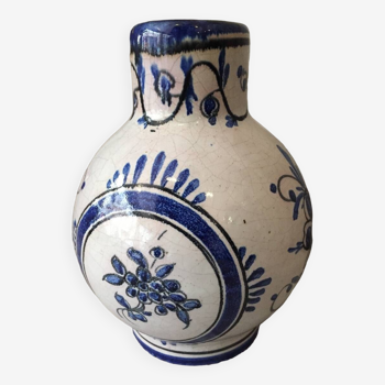 Small white decorative vase with blue floral decoration