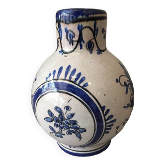 Small white decorative vase with blue floral decoration
