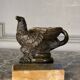 Eagle and serpent, bronze inkwell on a marble base.