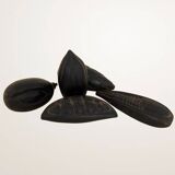 Set of decorative fruits in carved blackened wood.