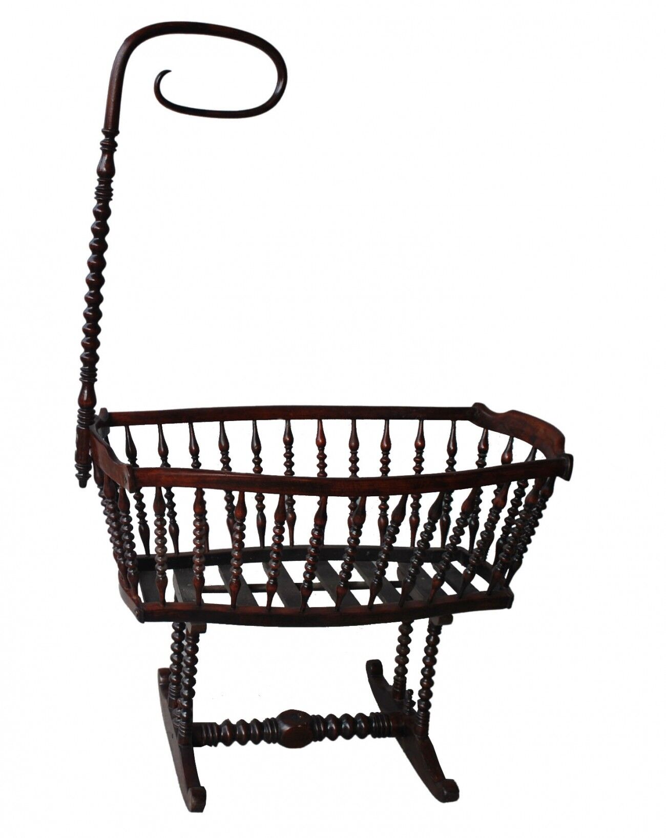 Old mahogany tinted exotic wooden cradle