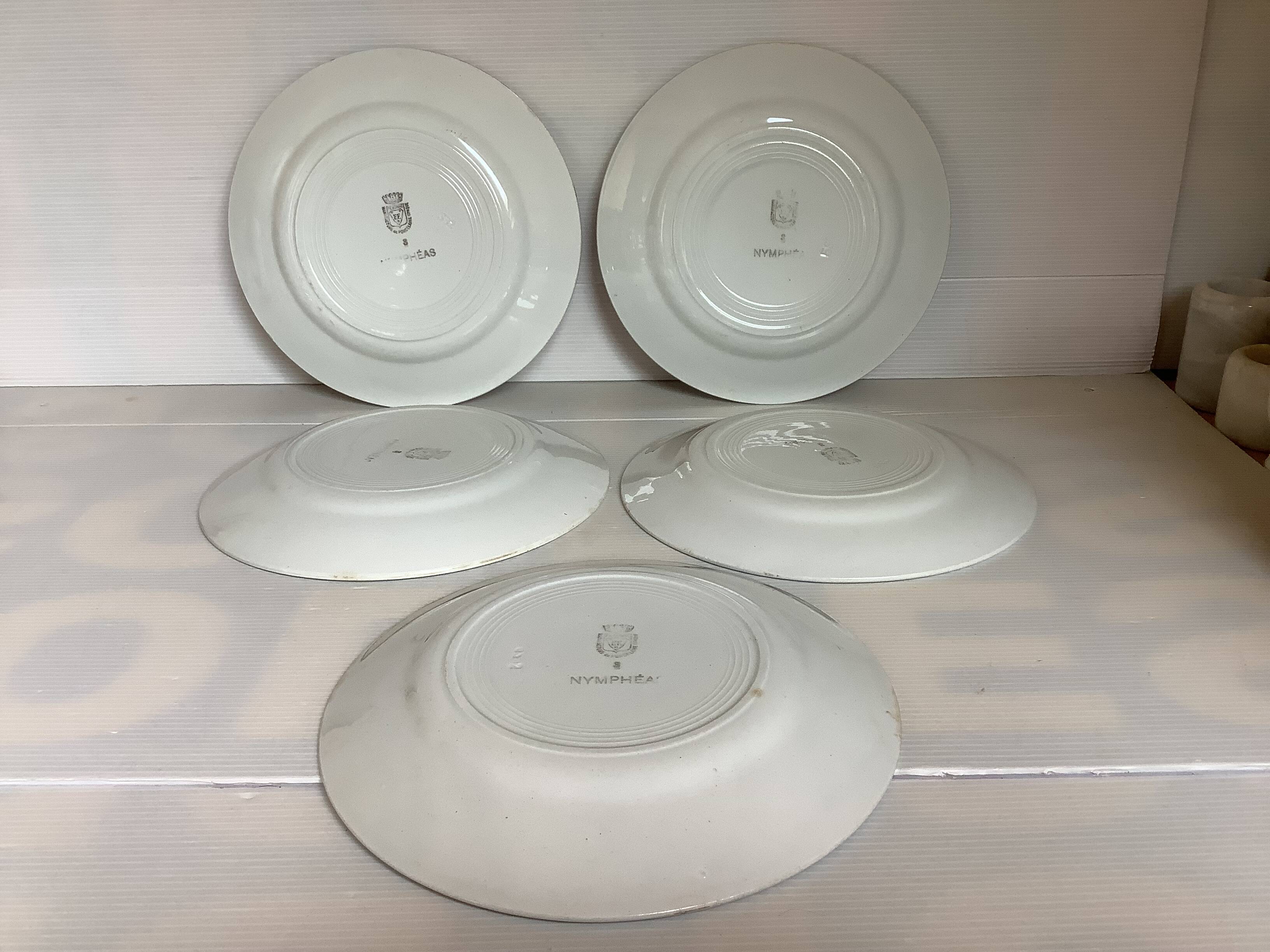 Five old flat earthenware plates from the 1930s, water lilies model