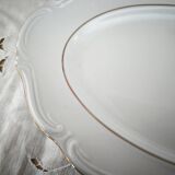 Oval porcelain plate with double gold line, hand-painted.